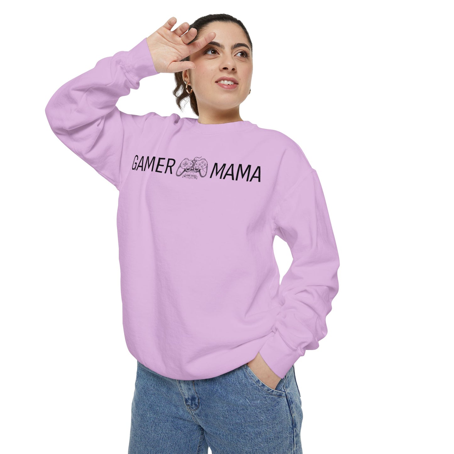 Woman wearing a light pink sweatshirt with 'Gamer Mama' text on a white background