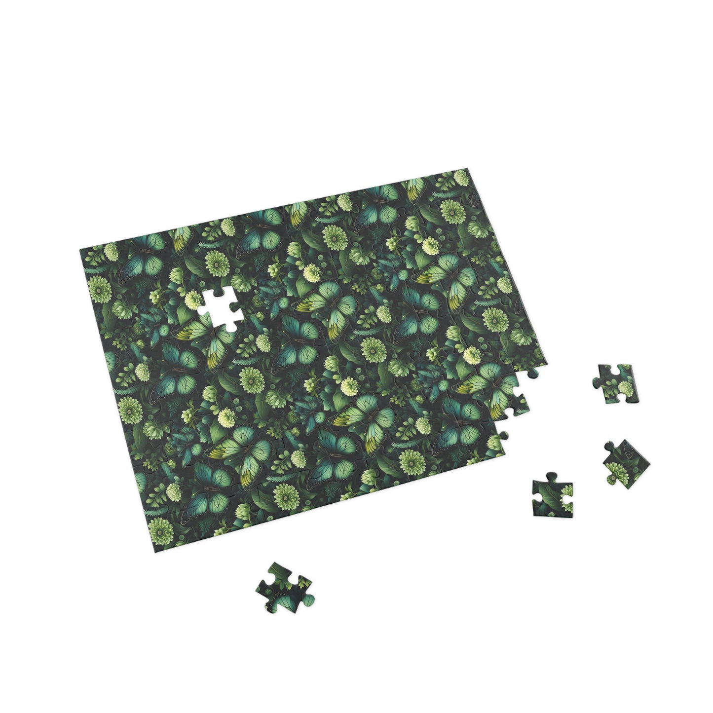 Jigsaw puzzle with green leaf pattern on a white background