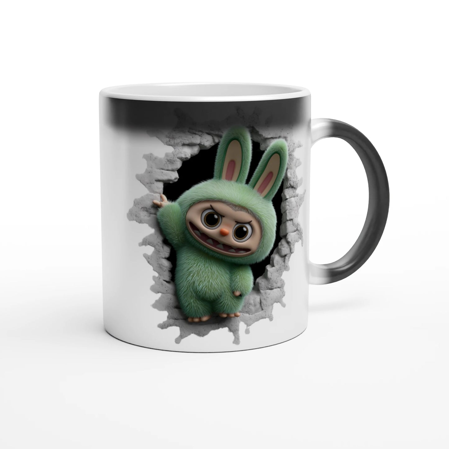 Mug with a green cartoon character peering through a hole in the wall design.