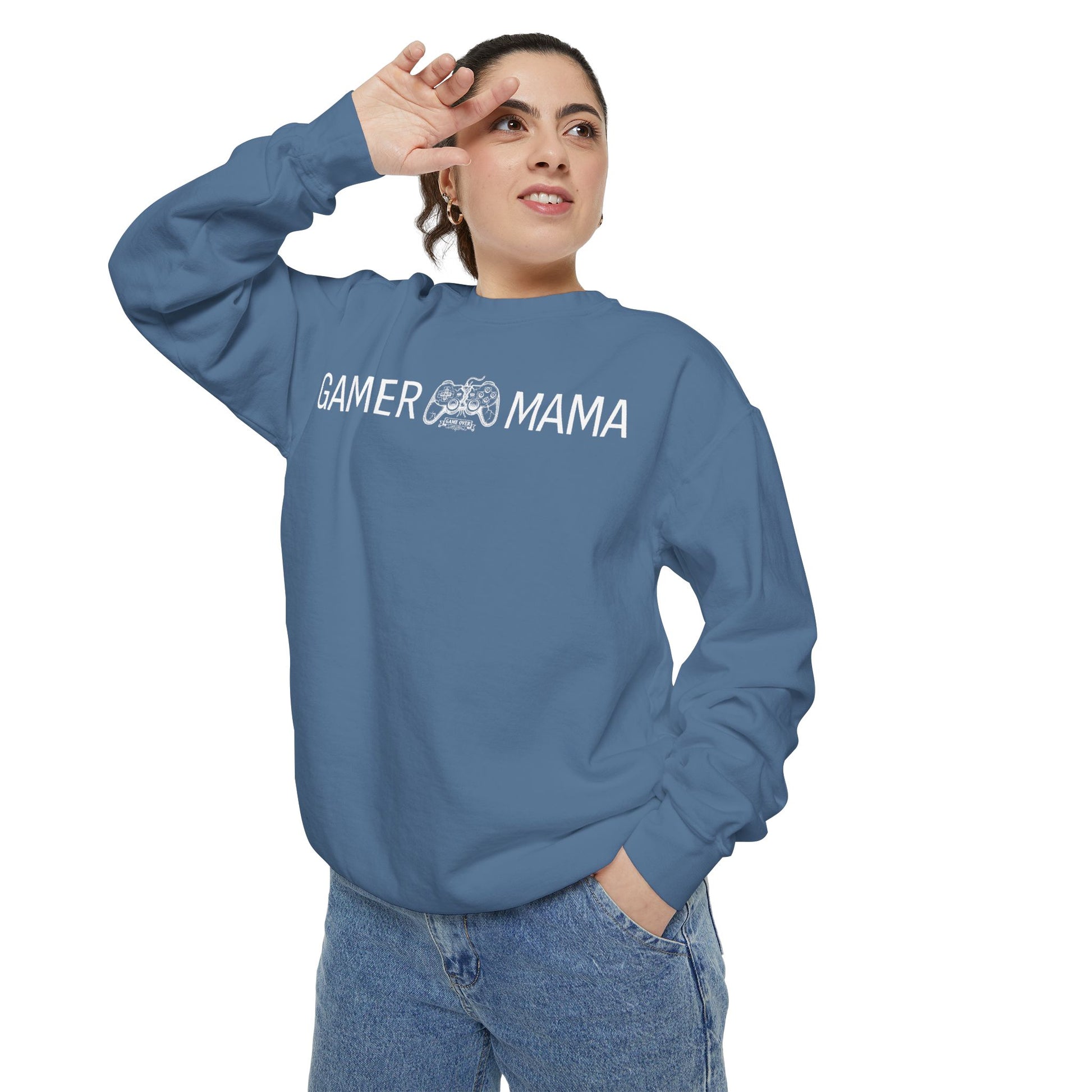 Woman wearing a blue sweatshirt with 'Gamer Mama' text on a white background