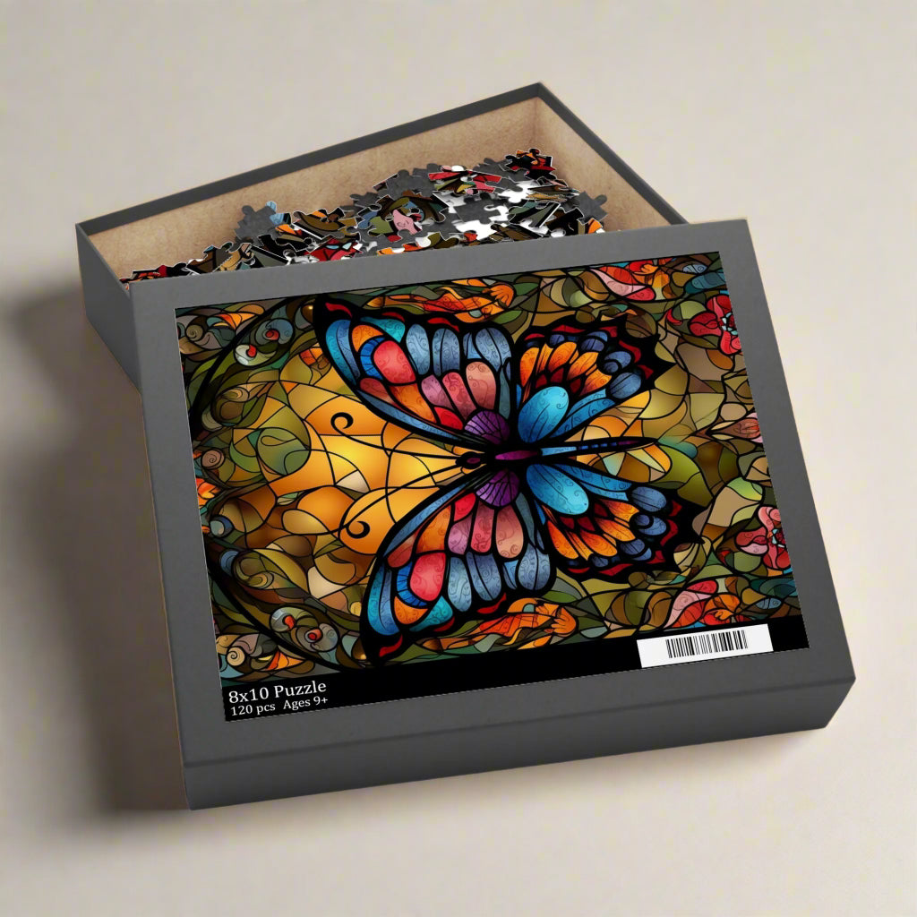 Jigsaw puzzle box with a colorful stained glass effect butterfly design on a white background