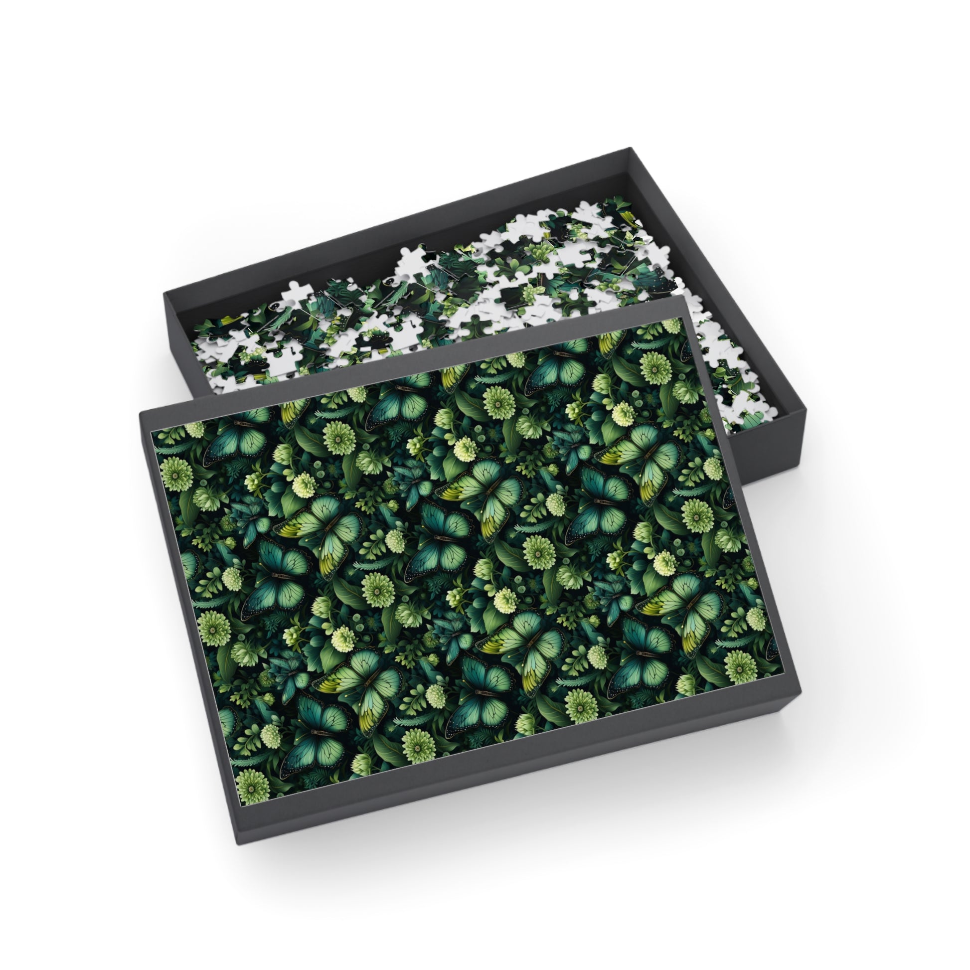 Two puzzle boxes with green floral patterns on a white background