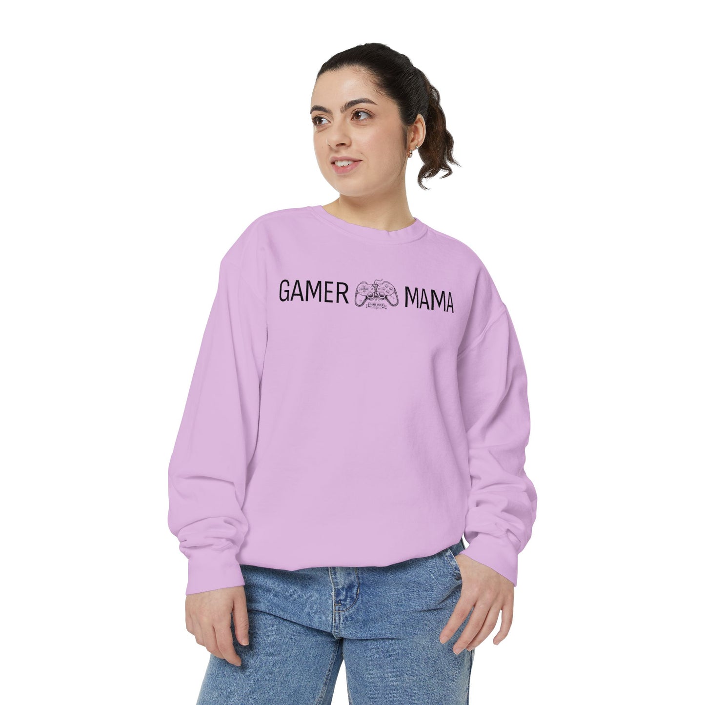 Woman wearing a light pink sweatshirt with 'Gamer Mama' text on a white background