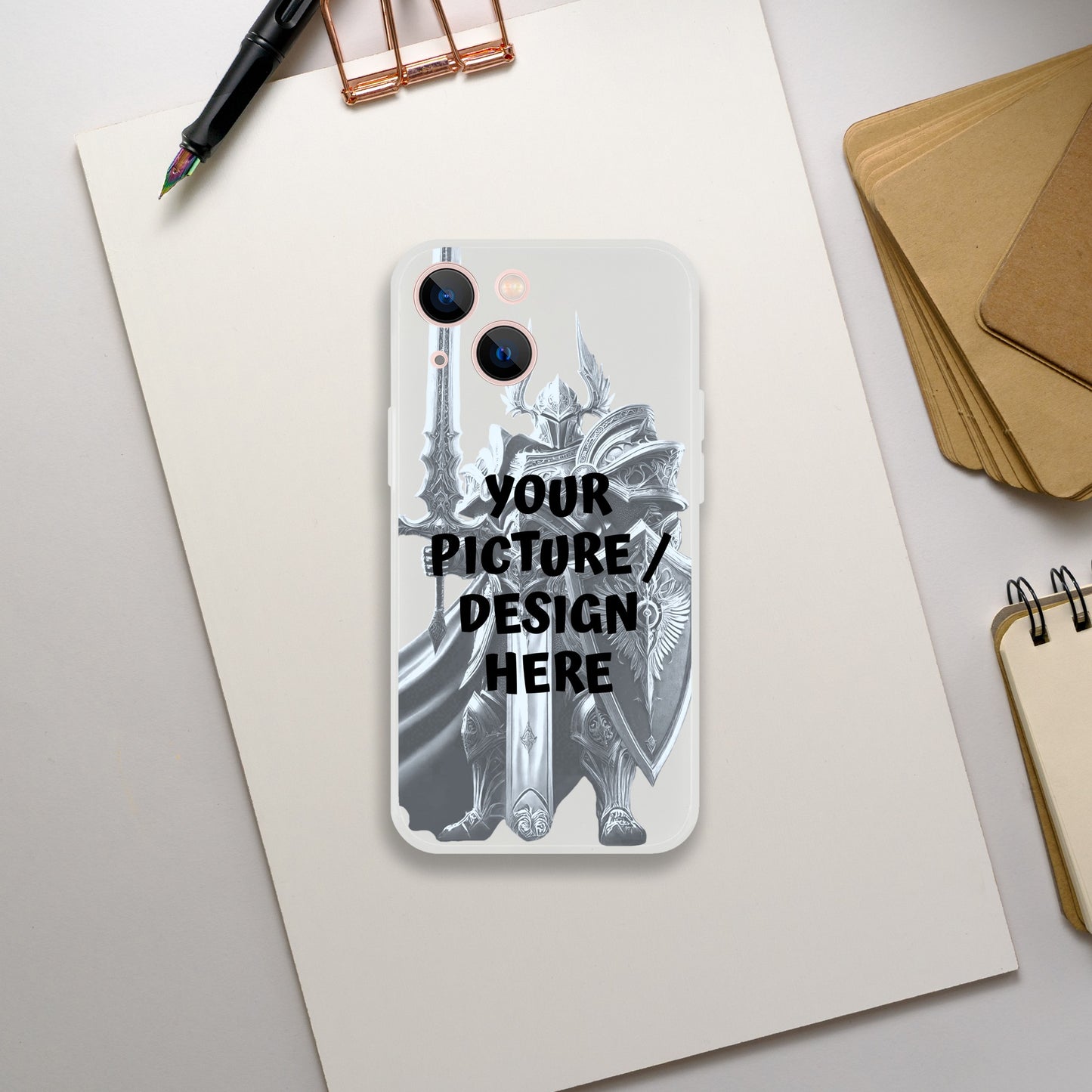 iPhone case with customizable text on a white surface with stationery items