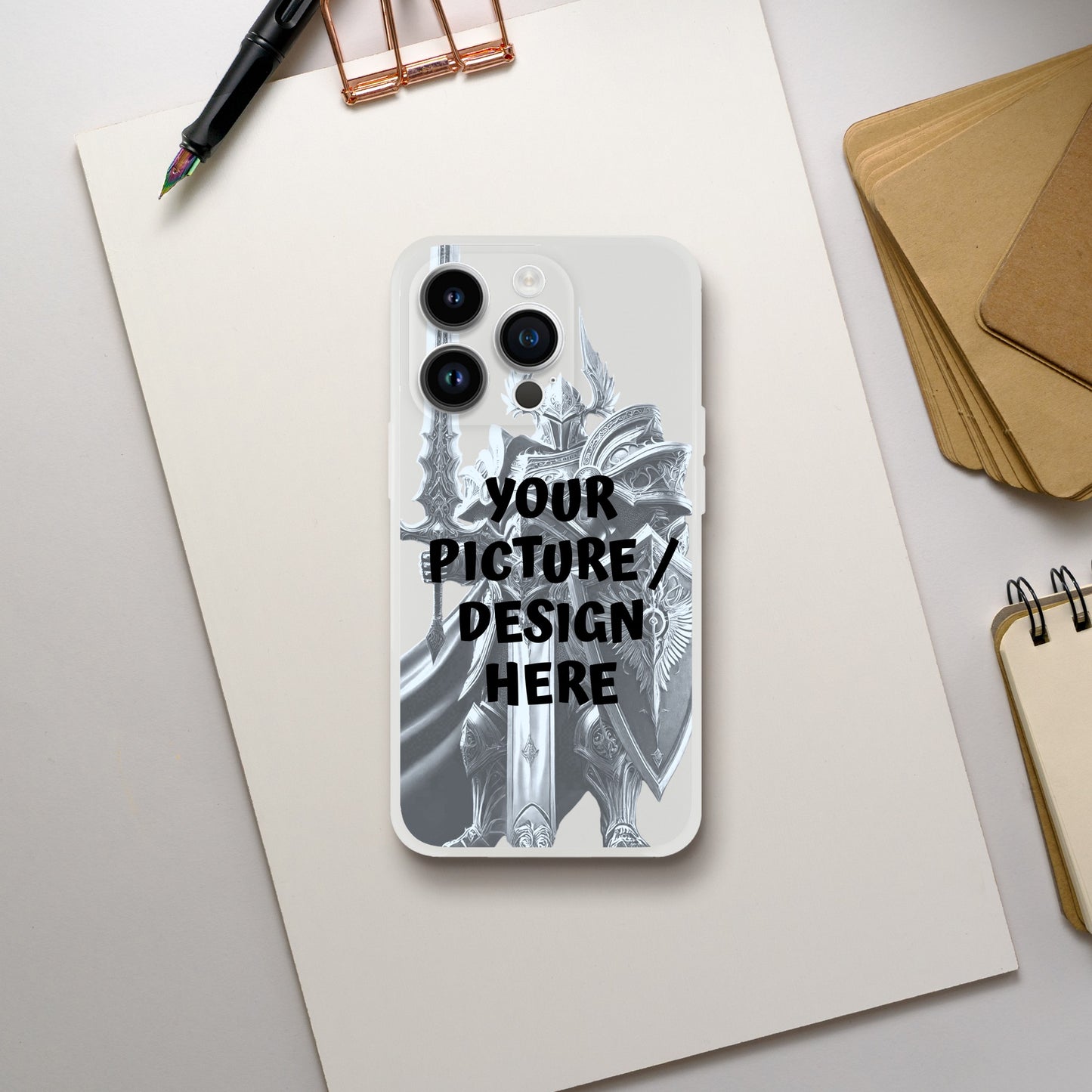 iPhone 15 case with customizable text on a desk with stationery items