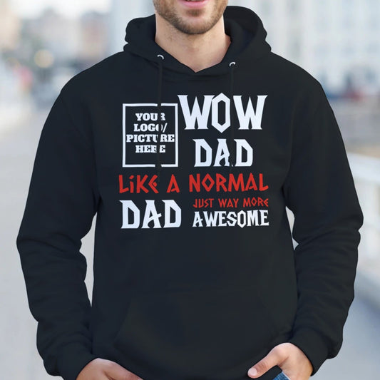 Man wearing a black hoodie with humorous text design, standing outdoors.