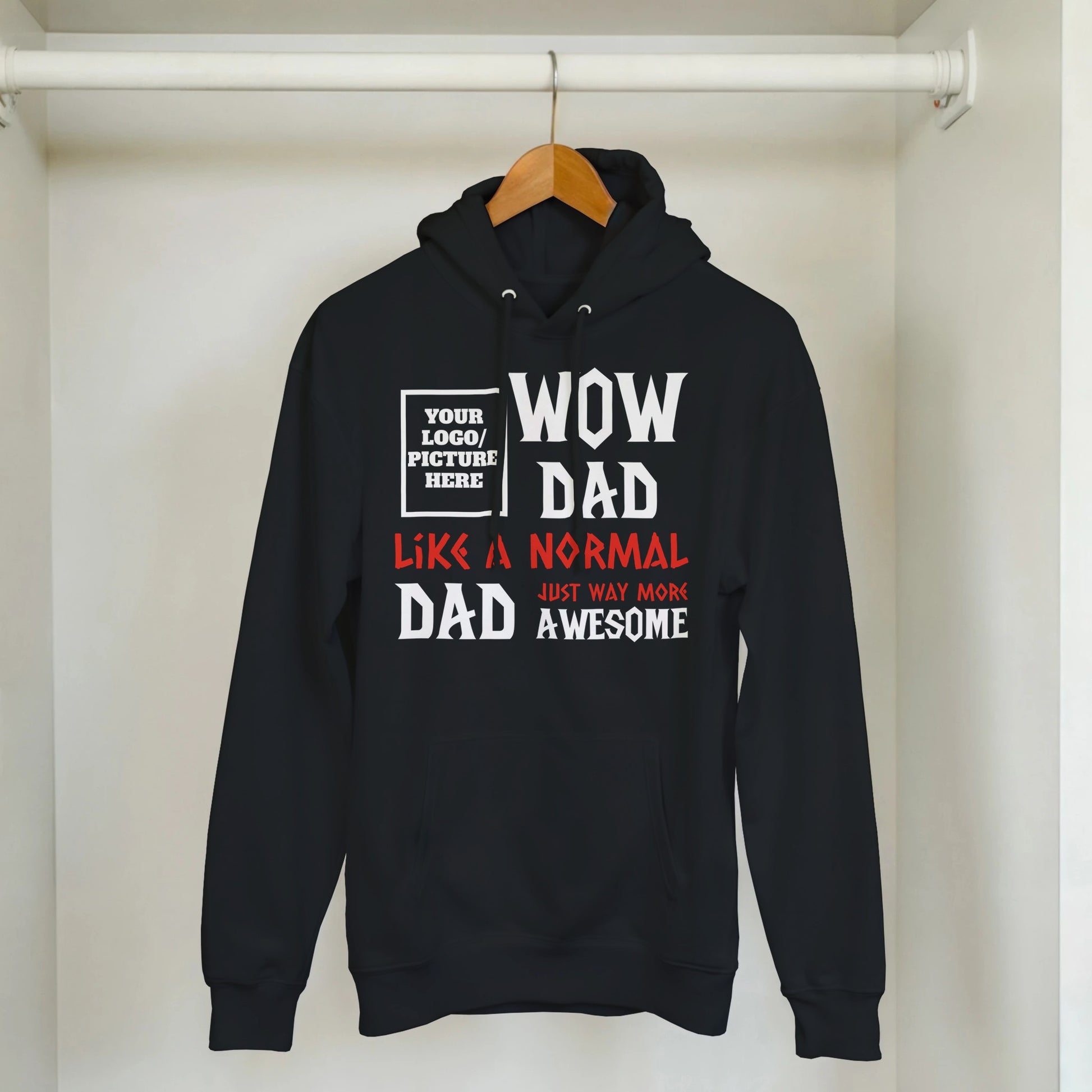 Black hoodie with text design on a hanger against a white background