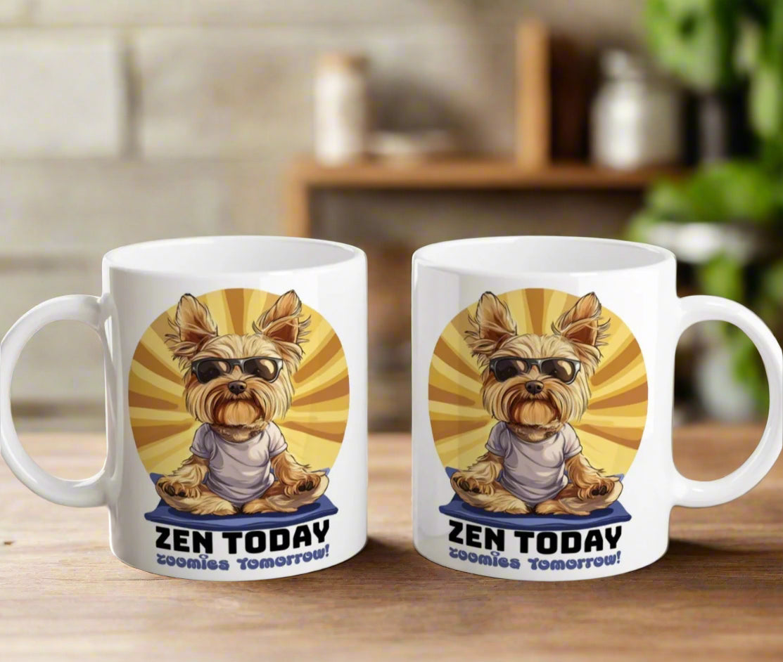 both sides view of a funny yorkie mug in a yoga pose with text 'zen today zoomies tomorrow' placed on the table with flowers behind