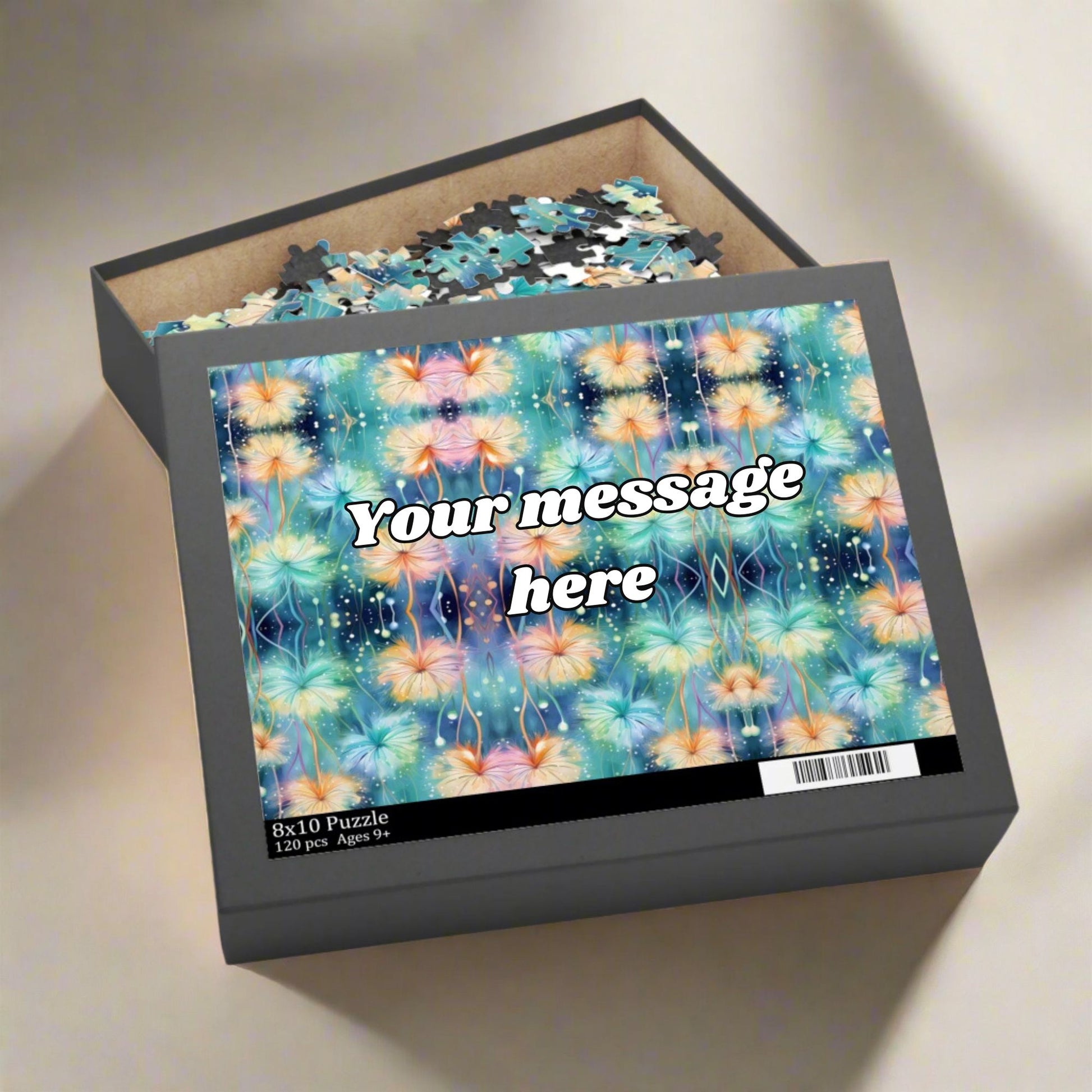 Jigsaw puzzle box with floral design and 'Your message here' text on a light background