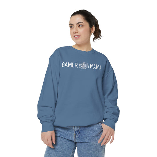 Woman wearing a blue sweatshirt with a white text 'Gamer MAMA' on a white background